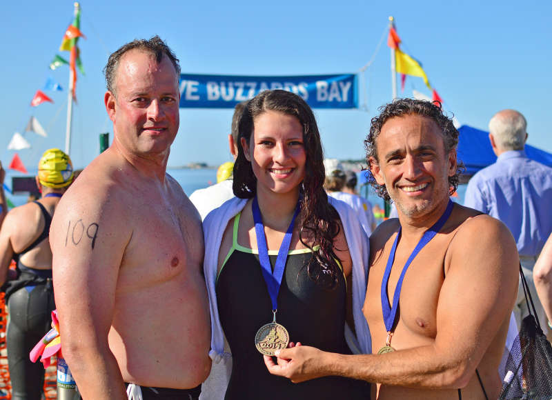 Swimmers pose with medals at the 2014 Buzzards Bay Swim finish line in Fairhaven