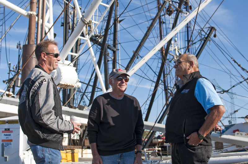 Rodney Avila with commercial fishermen on New Bedford Harbor
