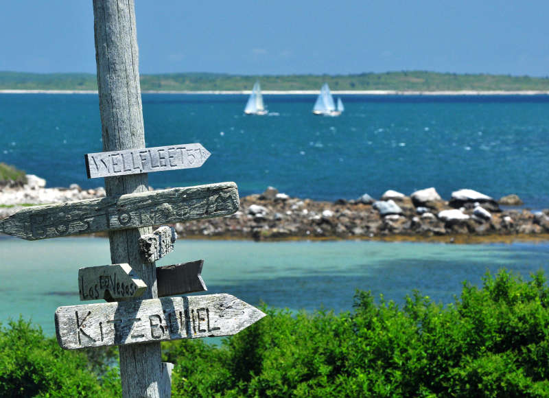 wooded directional signs on Penikese Island in Buzzards Bay