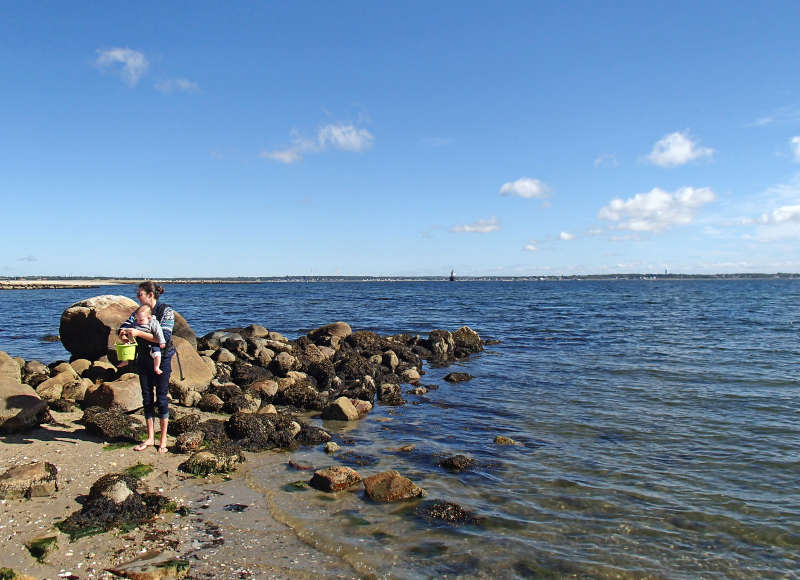 mother and baby on beach at Fort Taber