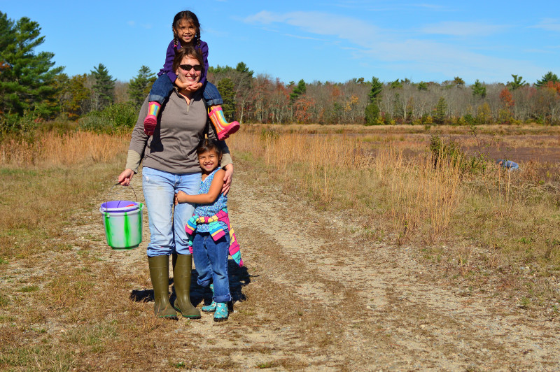a mother with two daughters on the trail at The Bogs