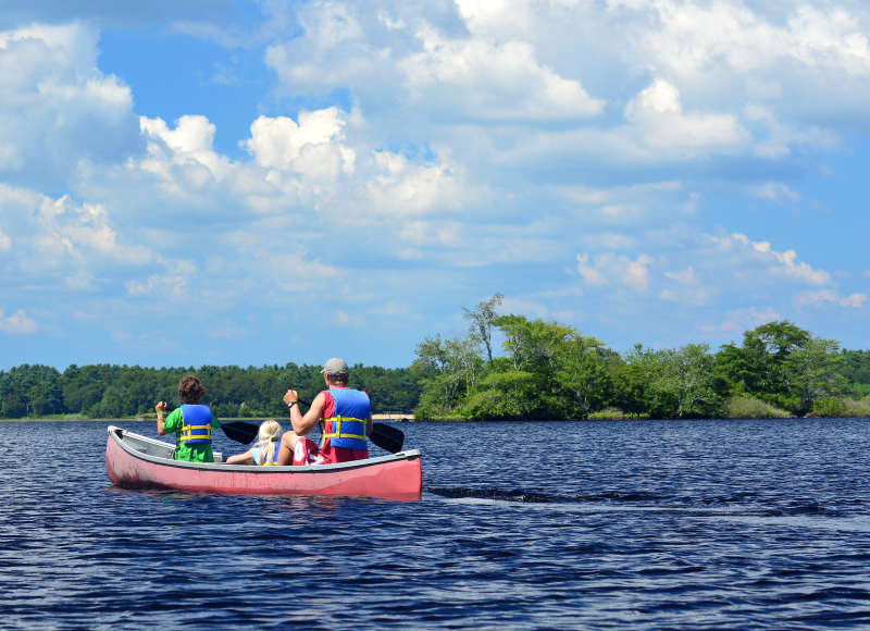canoeing across Snipatuit Pond in Rochester