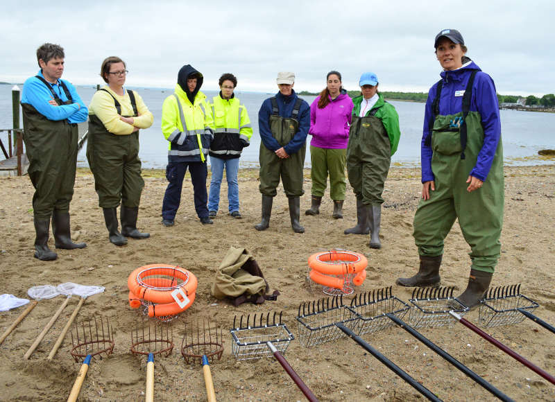 the Buzzards Bay Coalition leads a learn to quahog program for women on Mattapoisett Harbor