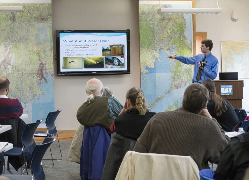 speaker giving a presentation at the Buzzards Bay Center in New Bedford