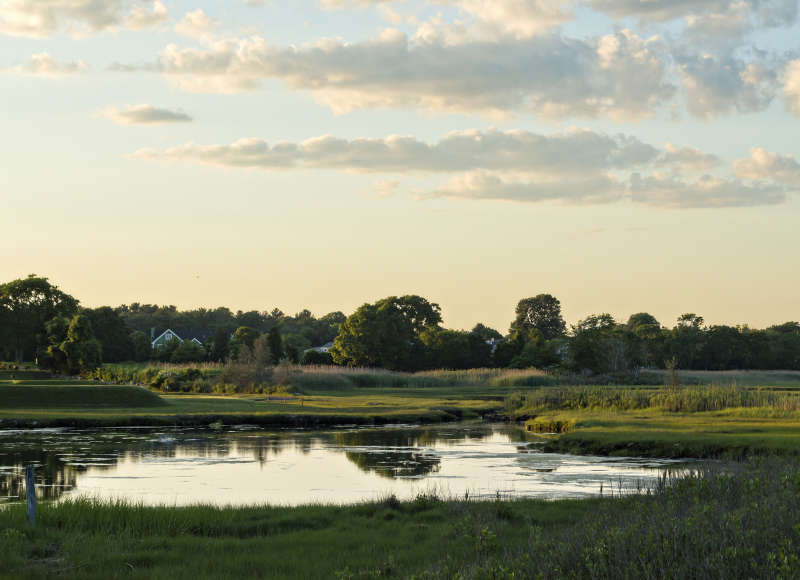 a golf course next to Eel Pond in Mattapoisett