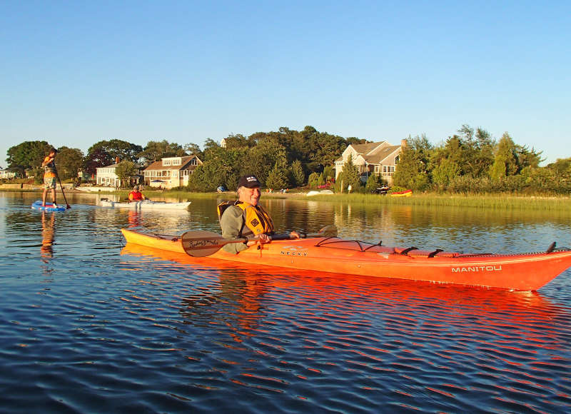 a Buzzards Bay Coalition member kayaks in Onset Bay
