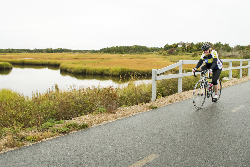 Buzzards Bay Watershed Ride cyclist on Shining Sea Bikeway in Falmouth