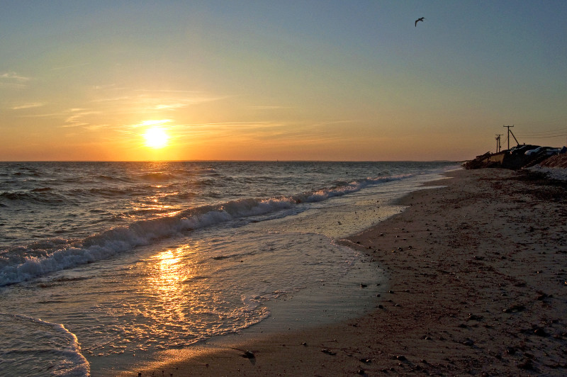 sunset over Buzzards Bay at Chapoquoit Beach in Falmouth