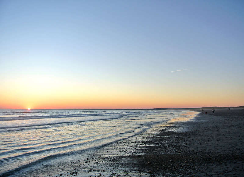 sunset over the water at Horseneck Beach State Reservation in Westport