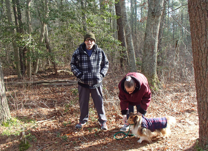 two people with a dog at Shoolman Preserve in Rochester