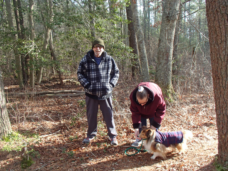 two people with a dog at Shoolman Preserve in Rochester