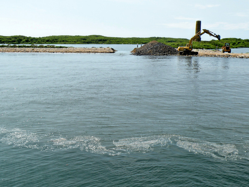 an inlet connects Cuttyhunk West End Pond with Buzzards Bay