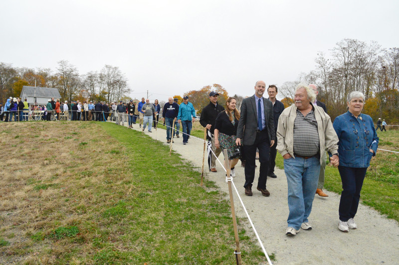 people walking down trail at The Sawmill in Acushnet after grand opening