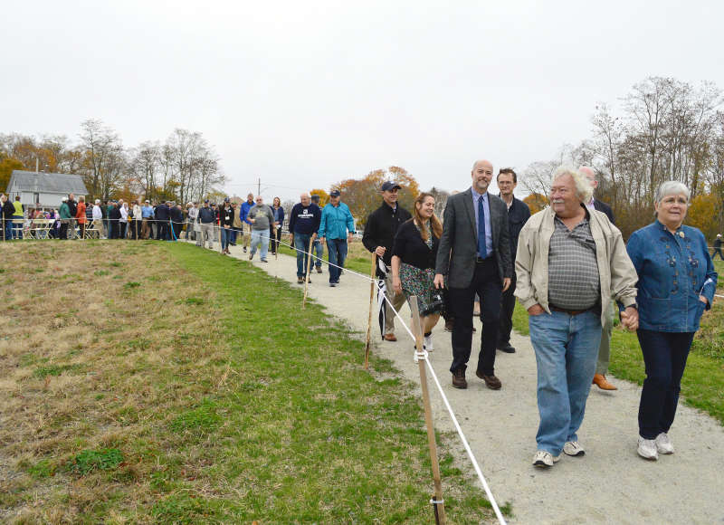 people walking down trail at The Sawmill in Acushnet after grand opening