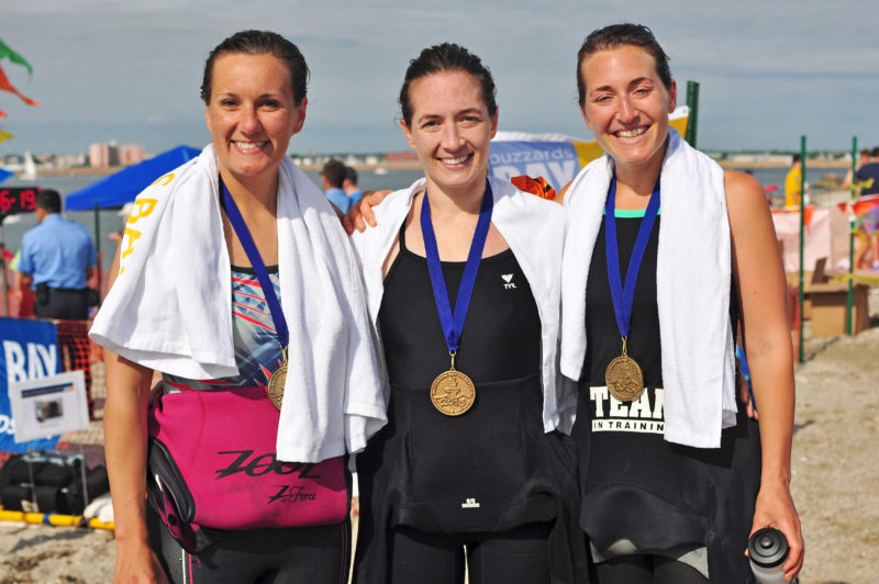 three women at the Buzzards Bay Swim finish line