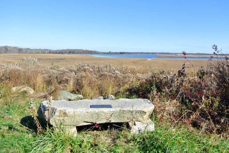 stone bench on the Quansett Trail at Allens Pond Wildlife Sanctuary in Dartmouth