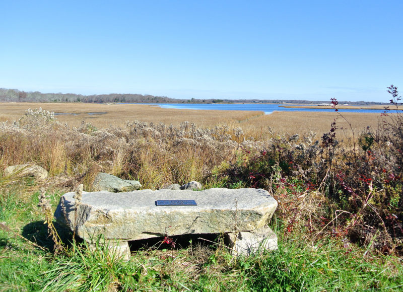 stone bench on the Quansett Trail at Allens Pond Wildlife Sanctuary in Dartmouth