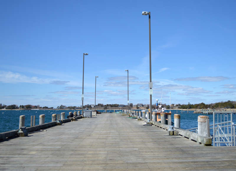 dock with commercial fishing vessels on Great Harbor in Woods Hole