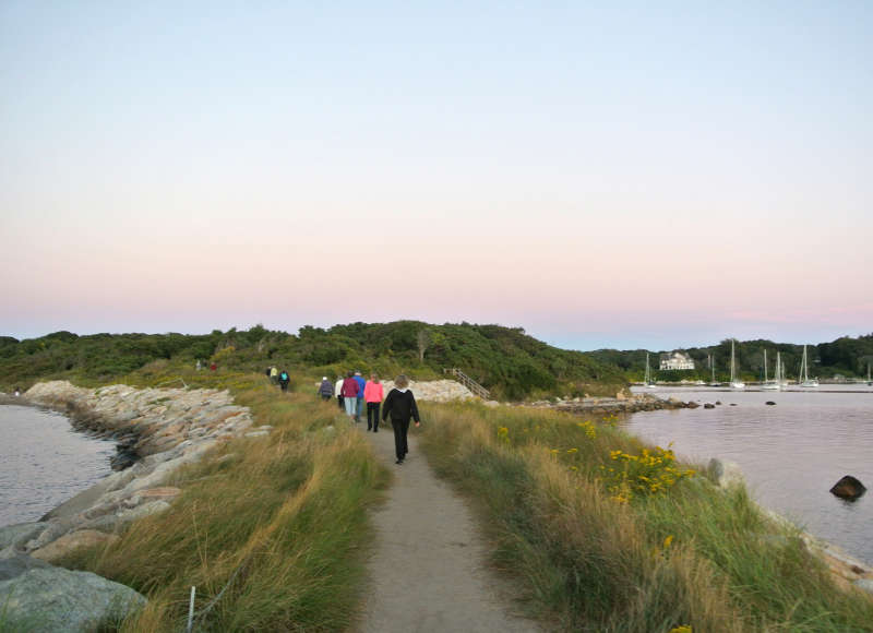 a group of people walking on the path at The Knob