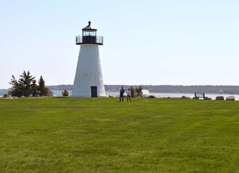 grassy lawn next to Ned's Point Lighthouse at Veterans Memorial Park in Mattapoisett