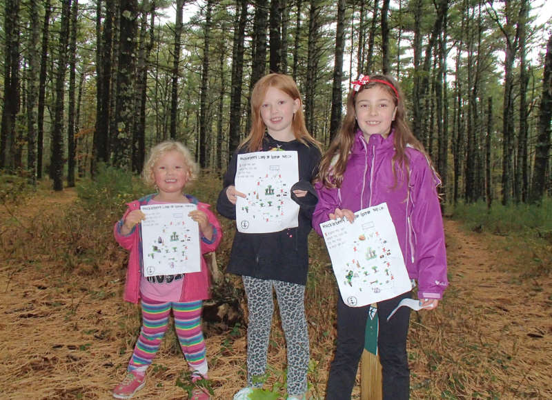 kids at a family outdoor program at Great Neck Wildlife Sanctuary