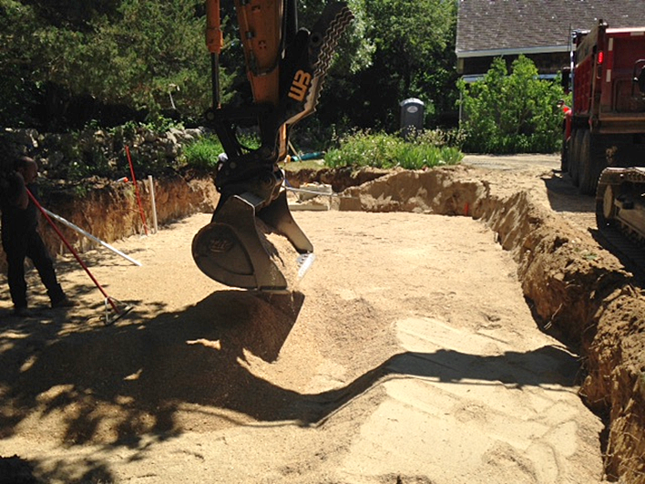 installation of a layer cake septic system in West Falmouth