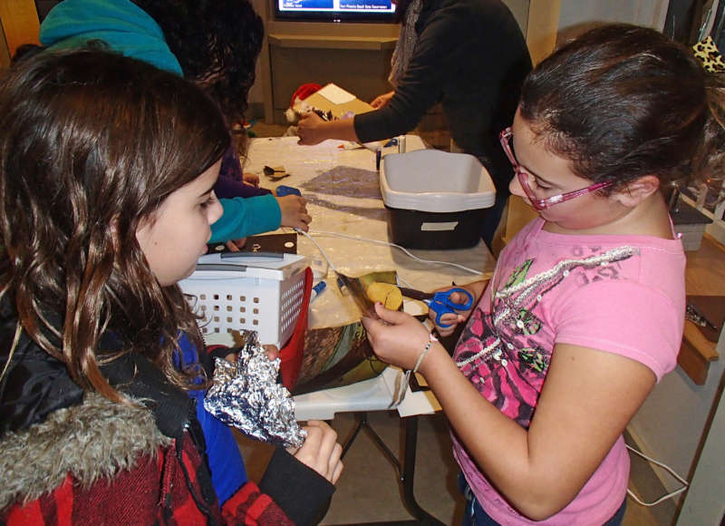 girls making art during AHA! Night