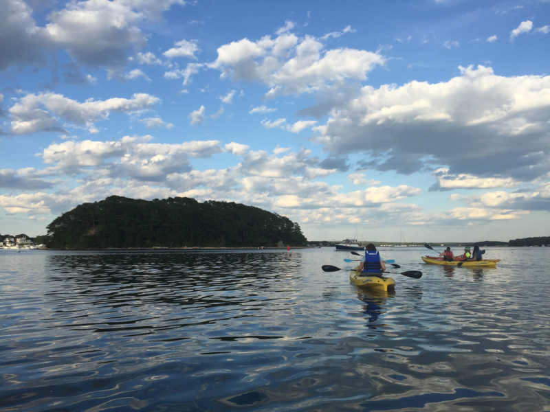 people kayaking in Onset Bay near Wickets Island