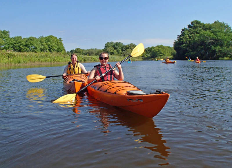 two women kayaking on the Westport River East Branch