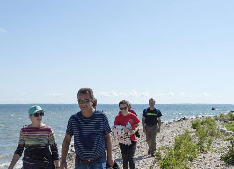 people walking on the beach at Gooseberry Island