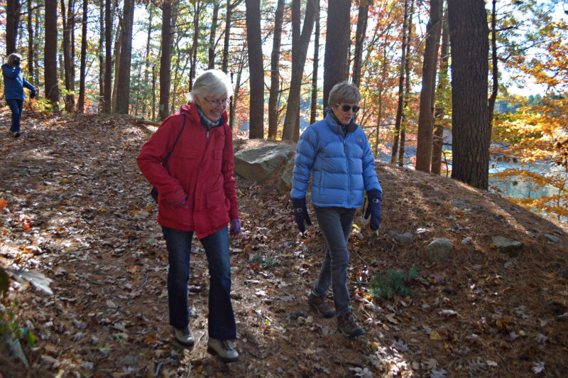 Two women walking on the Falmouth Moraine Trail at Long Pond.