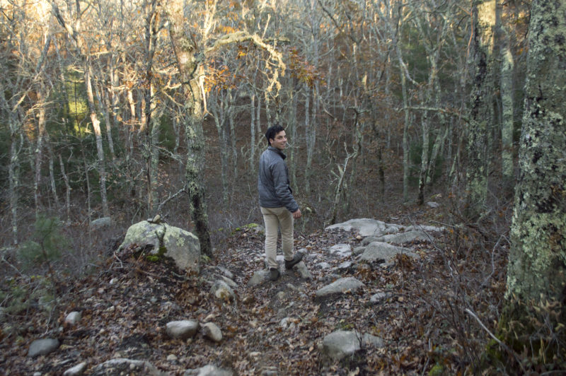 Man standing on the Falmouth Moraine Trail.