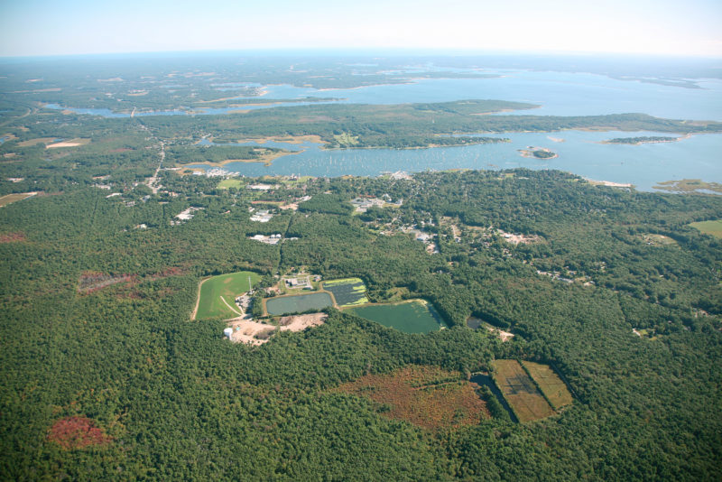 Aerial view of the sewage lagoons at the Marion wastewater treatment plant and nearby Sippican Harbor.