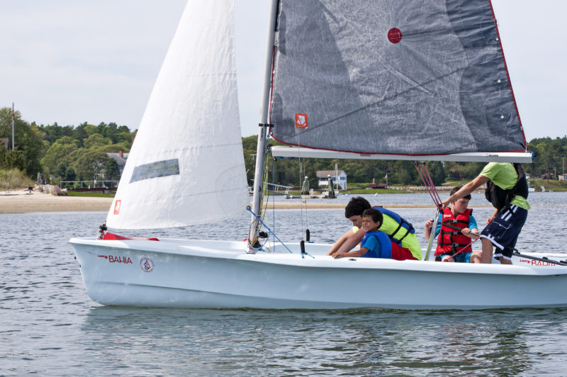 Kids learning to sail with the Community Boating Center and the Buzzards Bay Coalition on Onset Bay