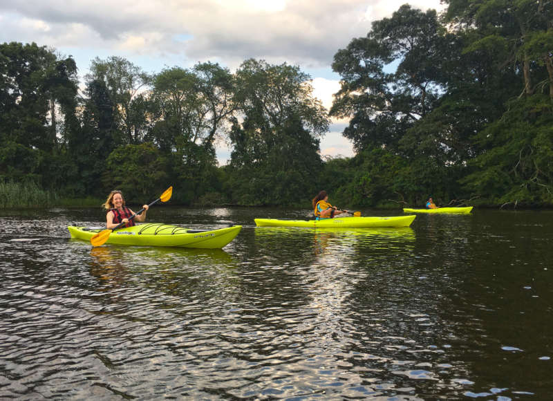 Women kayaking on the Westport River.