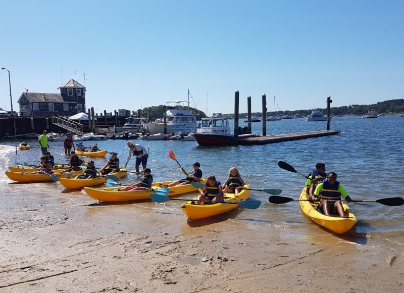 Kids in kayaks in Onset