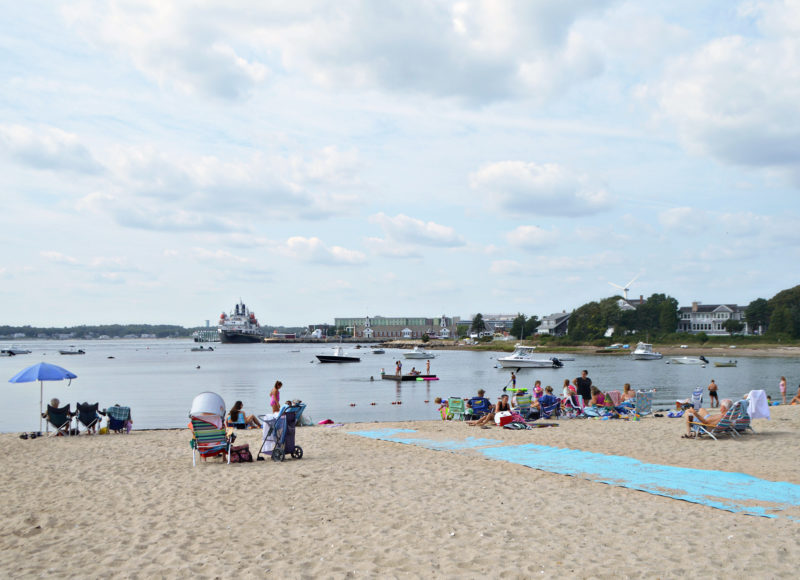 Large ship on the Cape Cod Canal seen from Gray Gables beach in Bourne