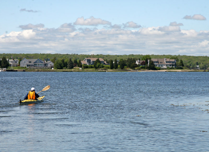 Richard Wheeler paddling on Apponagansett Bay