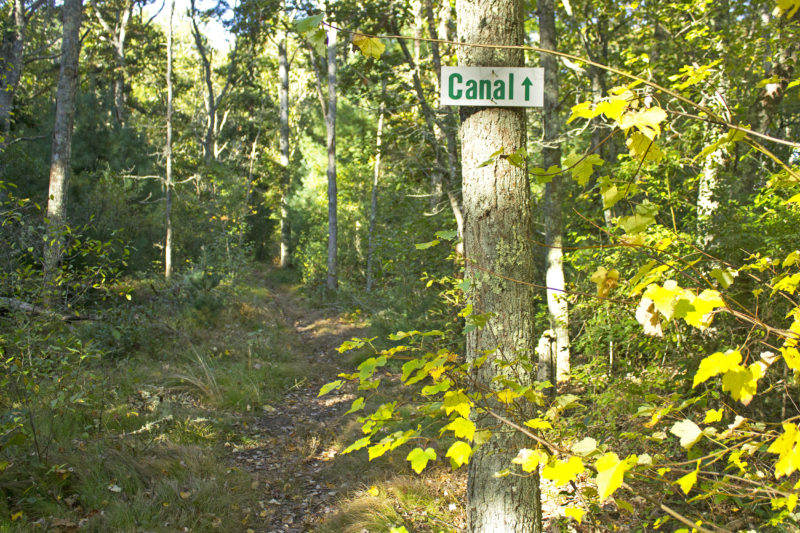 Sign for the Cape Cod Canal on the trails at Nickerson Conservation Area in Bourne