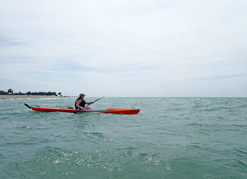Samantha Ladd paddling in open waters
