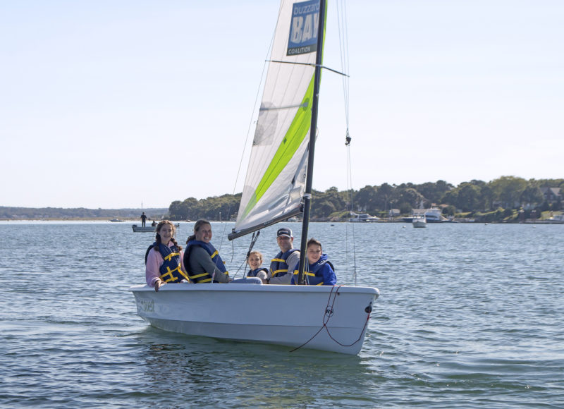 A family on Onset Bay in a Coalition sailboat