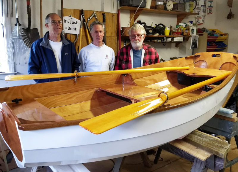 The Eastport Nesting Pram dinghy with its builders