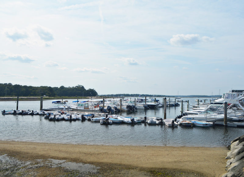 The slips along the dock at Monument Beach Marina in Bourne