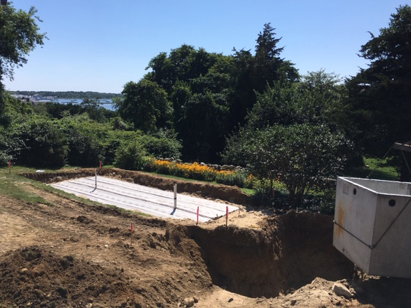 Layer cake going into dug-up yard, with Westport river in the distance