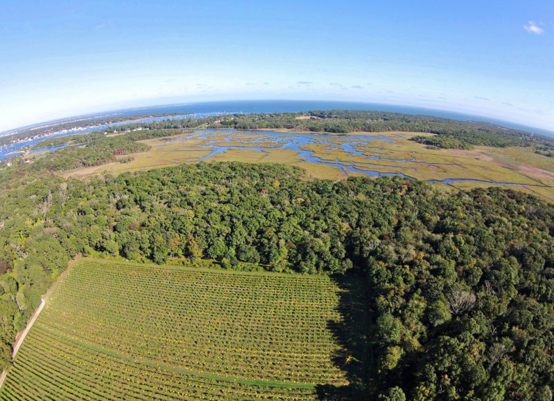 Aerial view of the farm fields and forests bordering Dike Creek in Dartmouth