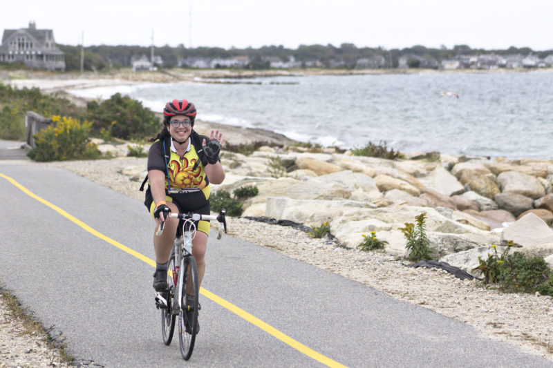 Woman on a bike on the Shining Sea Bikeway in Falmouth