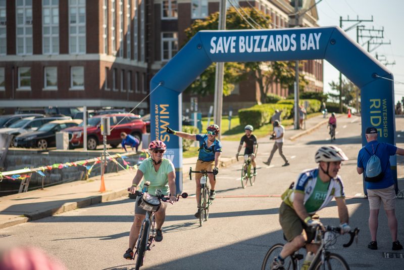 Bike riders come into the finish at Woods Hole