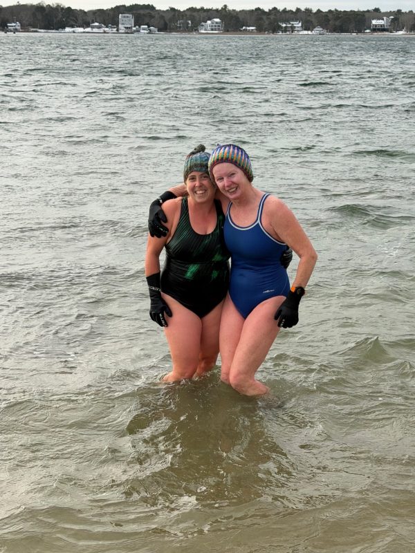 Grace Pietsch and Marese Barry-Belanger in Onset Bay after an immersion